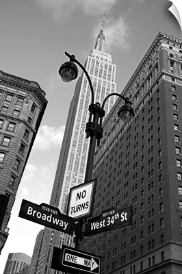 Empire State Building and street signs, Manhattan, New York City, NY