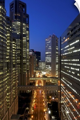 Eye level view of skyscrapers in commercial district of Tokyo- Shinjuku at dusk.