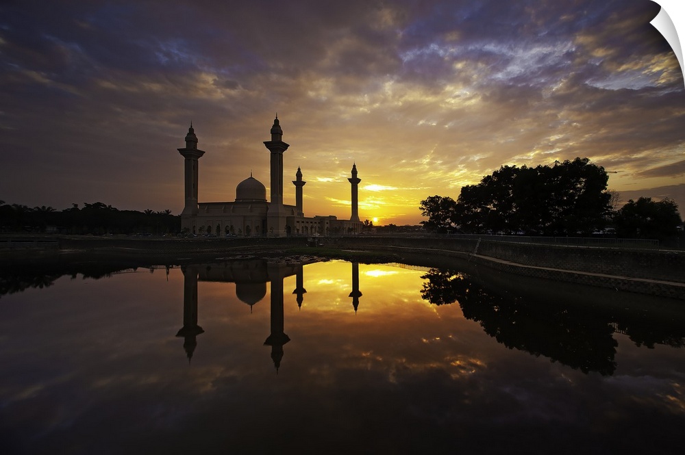 Sunrise over the Tengku Ampuan Jemaah Mosque, Bukit Jelutong, Shah Alam. The sky turns the most beautiful shade of orange ...
