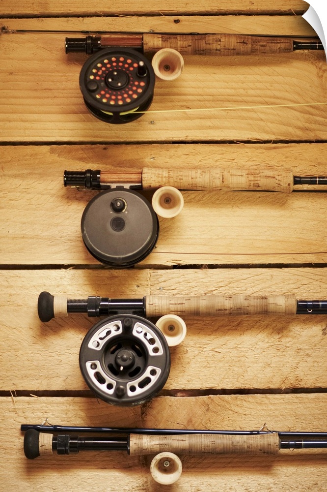 Fly fishing reels hanging on wall