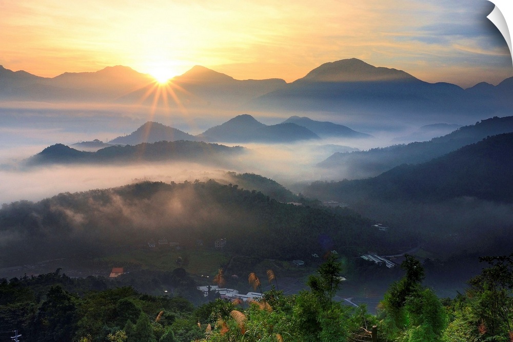 Foggy mountain at sunrise, in Nantou County, Taiwan.