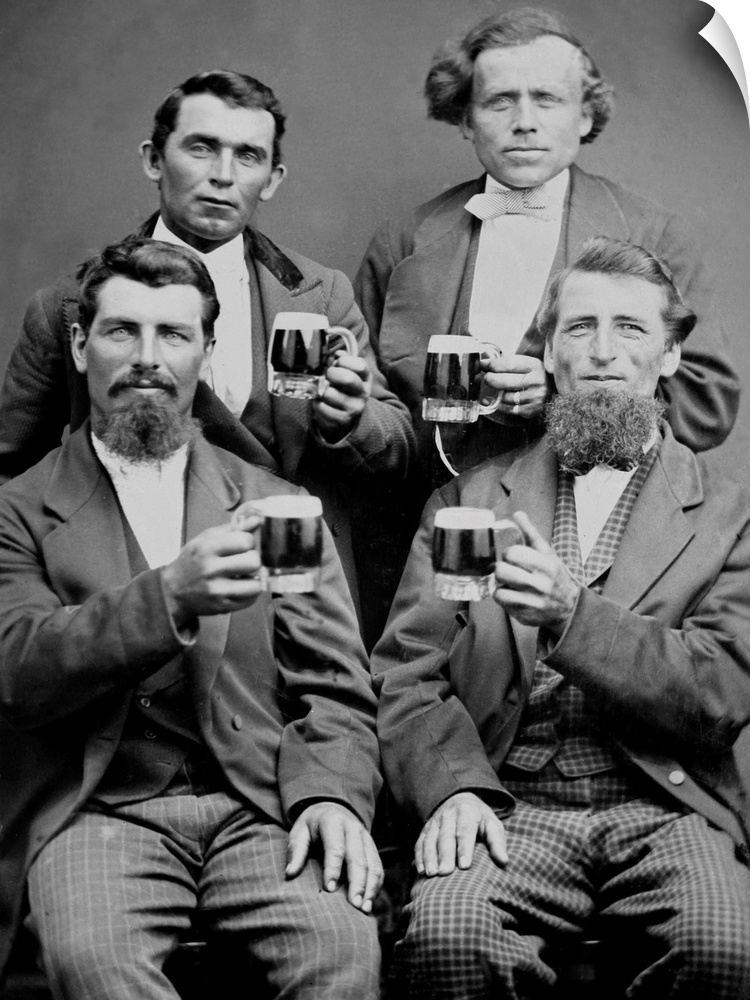 Four buddies get together and toast themselves with beer for a tintype portrait.