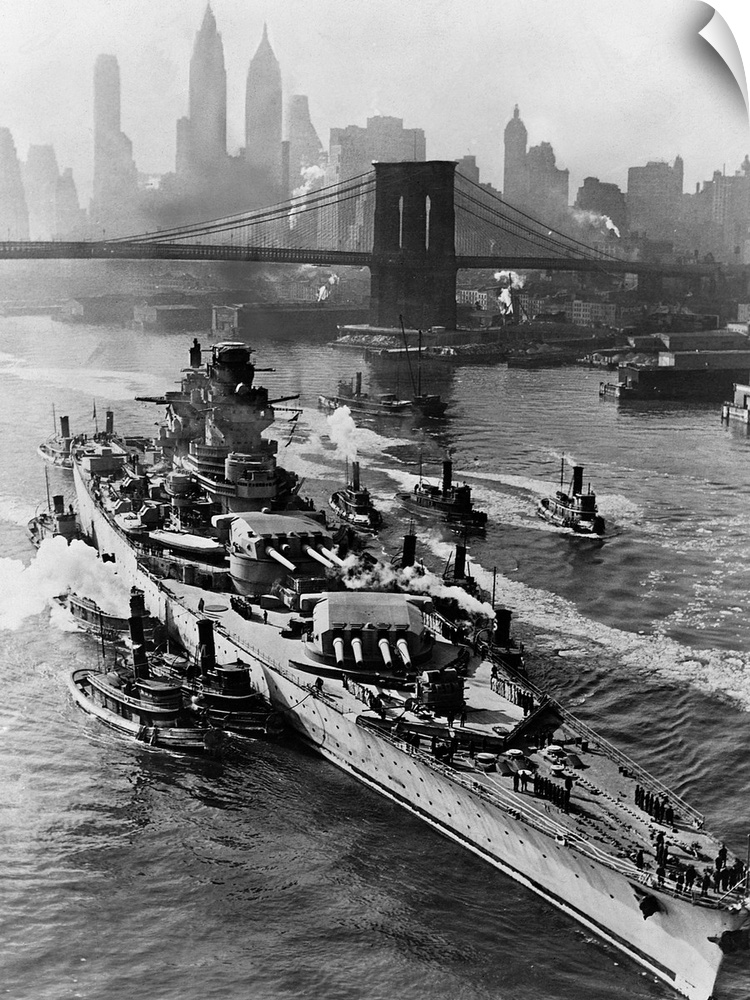 The 35,000 ton French battleship Richelieu passes the Brooklyn Bridge as tugboats maneuver her toward a U.S Navy Yard, whe...