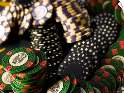 Gambling chips jumbled together, close-up