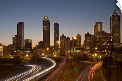 Georgia, Atlanta, traffic on highways leading towards downtown city at dusk
