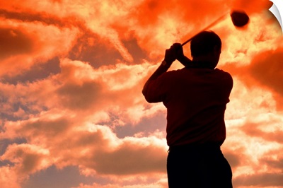 golf player in the sunset