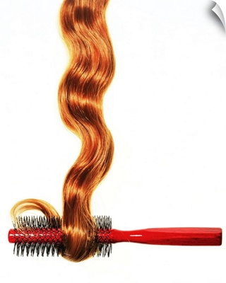 Hair coiling around brush