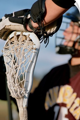 Hand on a Lacrosse Stick