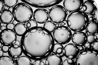 Huge amount of bubbles in fluid. Fluid mixture of oils.