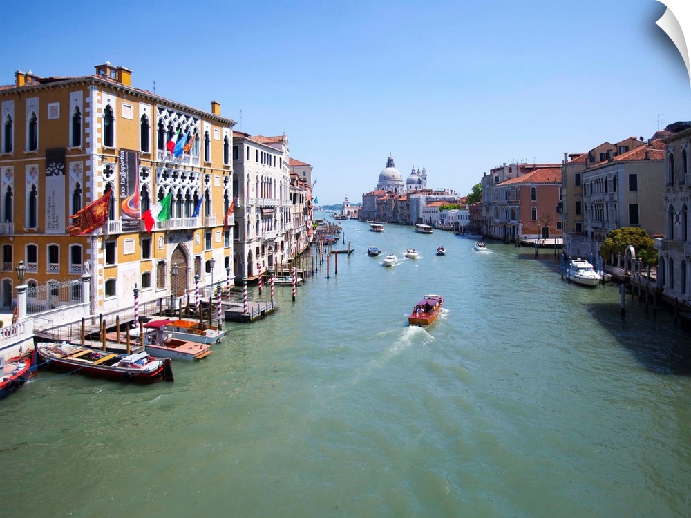 Italy, Venice, Boats on canal in city