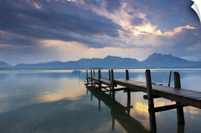 Jetty at Lake Forggensee after a thunderstorm, Bavaria, Germany