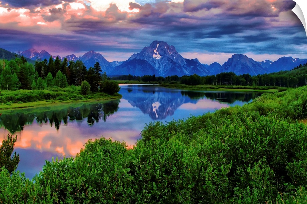 Giant, landscape photograph of morning light breaking through a stormy cloud cover over the Snake River, at Oxbow Bend in ...