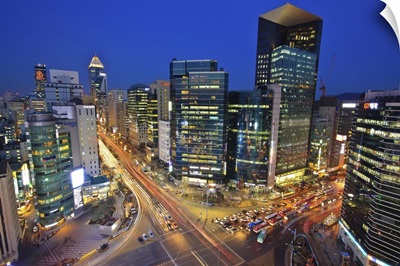 Light trail and buildings at the intersection, Seoul, Korea.