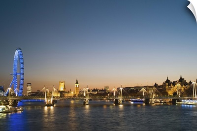 London, view along River Thames towards Houses of Parliament and Millennium Wheel