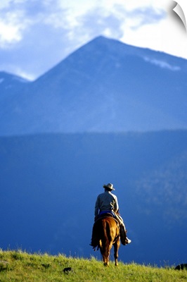 Lone Cowboy riding the range in Montana