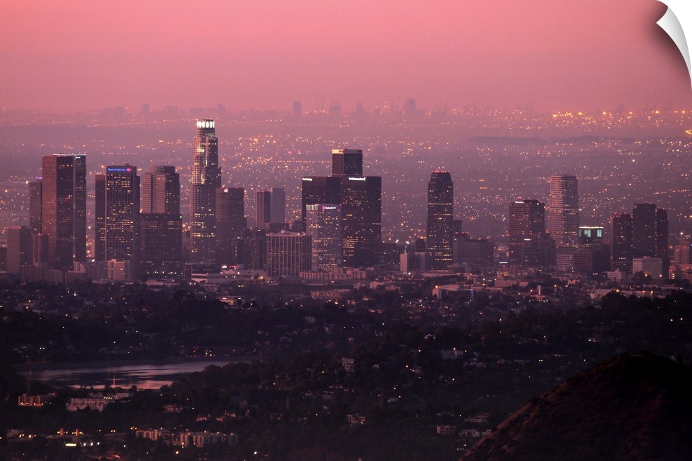 Colorful predawn light falls on downtown Los Angeles. Silver Lake  visible in foreground.