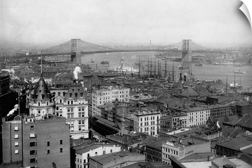 A view of the Brooklyn Bridge from a neighborhood in the Lower East Side of Manhattan. The Brooklyn Bridge was the largest...