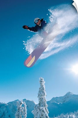 Man Snowboarding On Sunnny Day