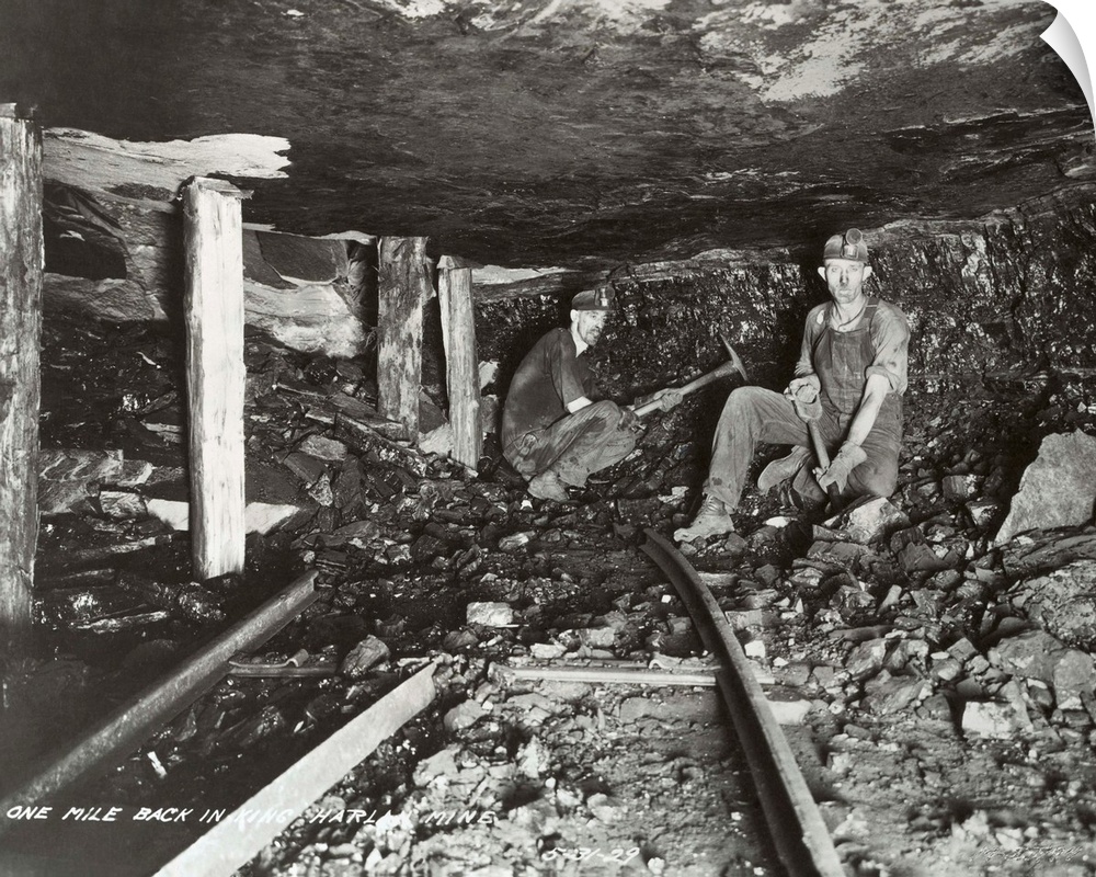 Coal miners once cut coal from the face of the seam with a pick and loaded it with hand shovels. This photograph made in 1...