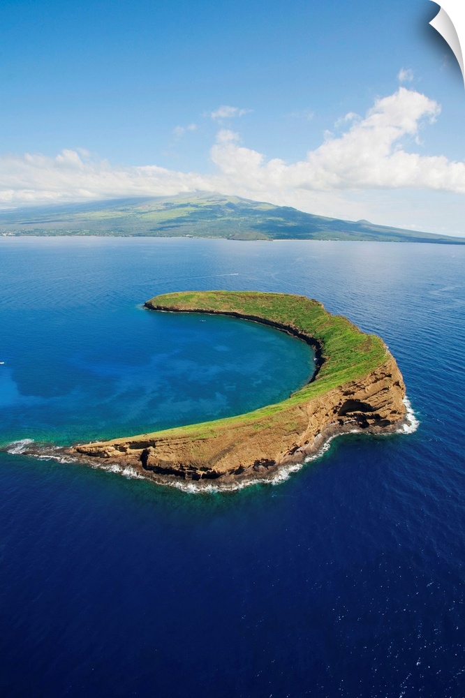 Molokini islet, famous snorkeling location off the coast of Maui, Hawaii. Molokini is a marine preserve protected by the S...