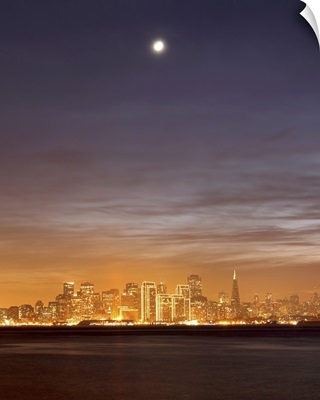 Moon setting over San Francisco on hazy December evening, taken from Treasure Island.