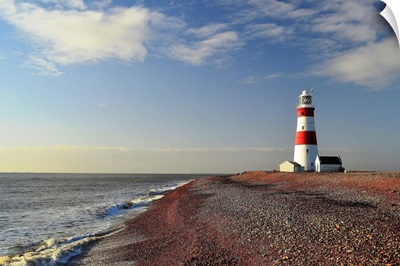 Morning light at Orford Ness Lighthouse with sea