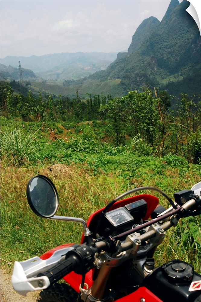 Adventure motorbike trip through mountains from Luang Prabang to Vang vieng, Laos, South East Asia.