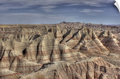 Natural formations in Badlands of South Dakota, showing striations and contours.