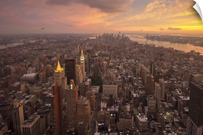 New York City of Manhattan at Sundown with beautiful clouds.