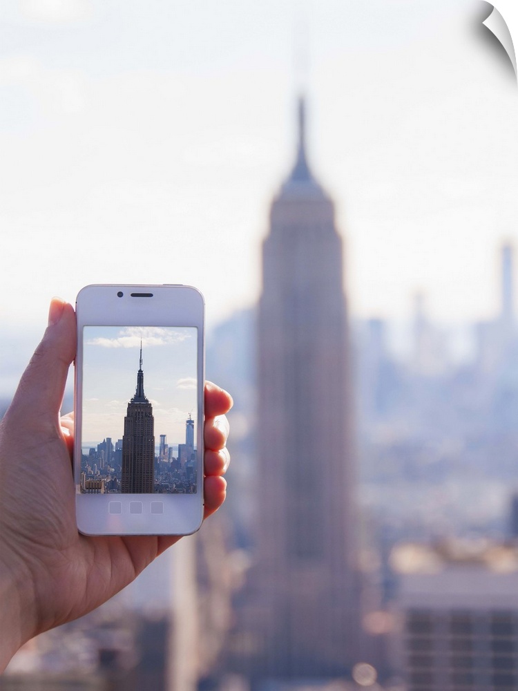 USA, New York State, New York City, Manhattan, Tourist taking photo of Empire State Building