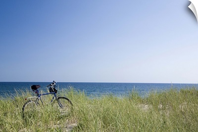 Ocean and horizon with clear blue sky in background.