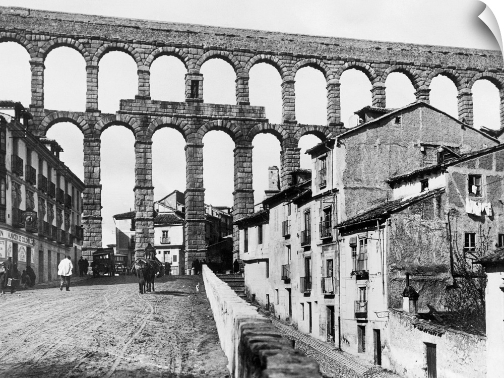 Open Plumbing 1,900 years old - excellent photo of the magnificent aqueduct at Segovia, Spain, built by the first Roman em...