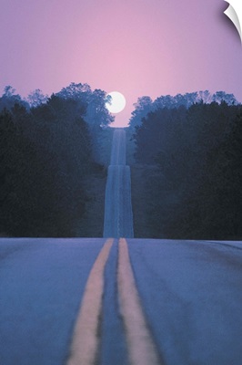 Open road with moon rising