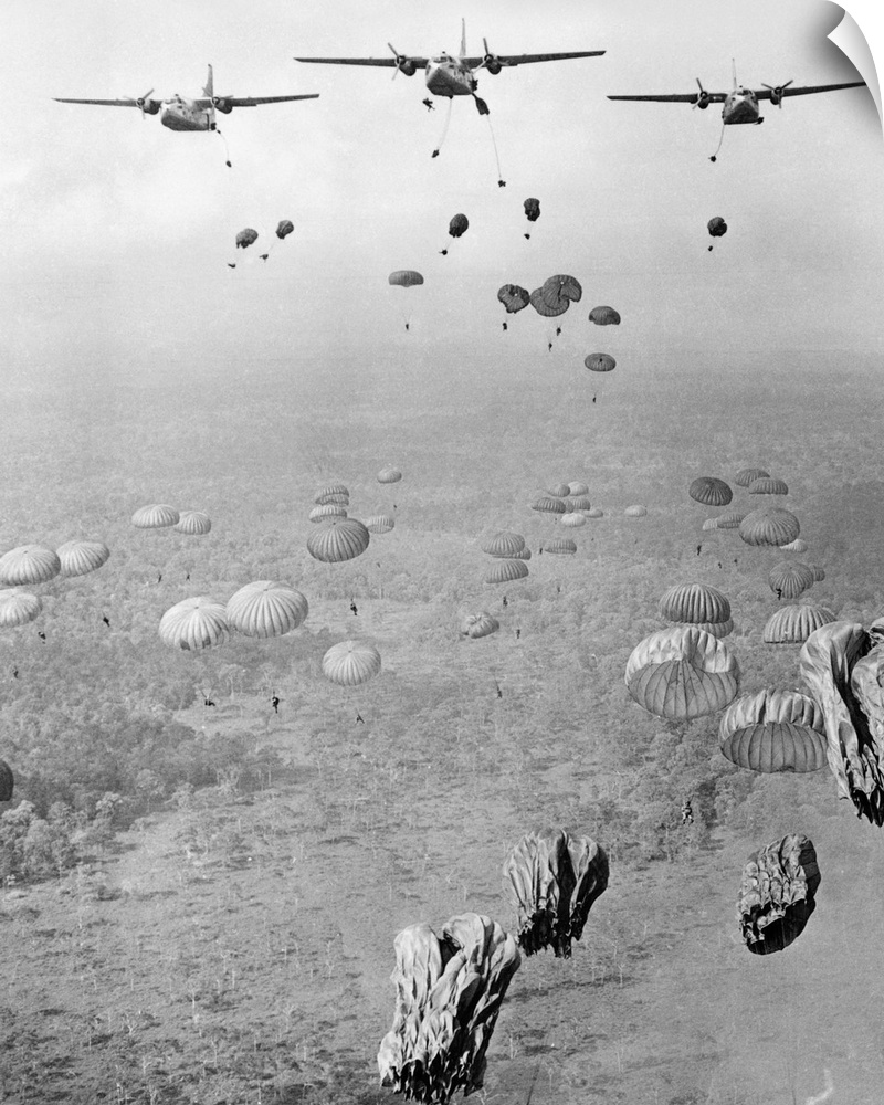 In two minutes, some 840 Vietnamese paratroopers are dropped from 16, US Air Force, C-123 transport planes in an attack on...