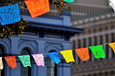 Papel picado banners strung around the Plaza del Pueblo de Los Angeles for Cinco de Mayo