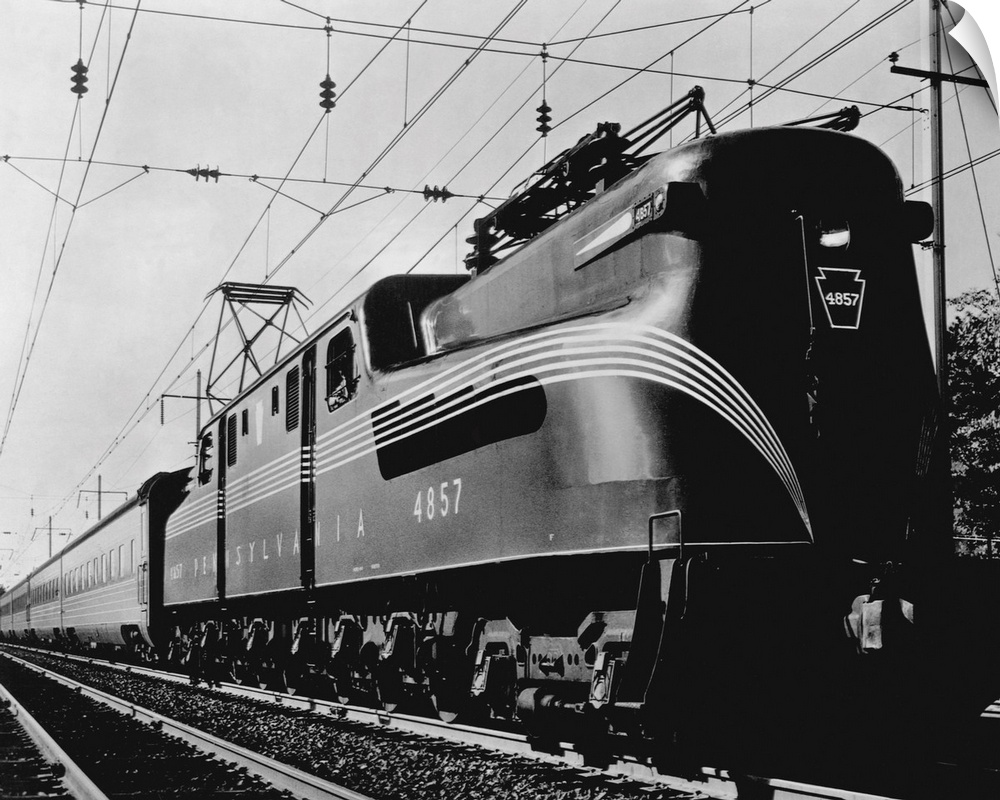 The Broadway Limited, an all sleeping car GG-1 type electric train on the Pennsylvania Railroad main line between New York...