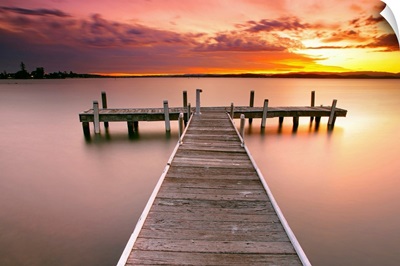 Pier in Lake Macquarie at sunset, Belmont, NSW, Australia.