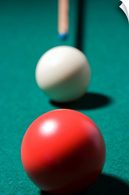 Pool cue with balls