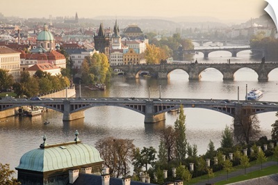 Prague Cityscape with the Vltava River and its Bridges at sunset