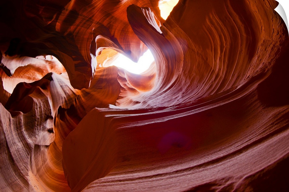 Waves of rock are shown in Antelope slot Canyon. Rock pattern formed over millions of years of flash flooding, now dry 1/4...