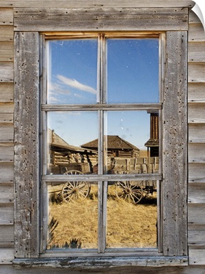 Reflection in window of old western town
