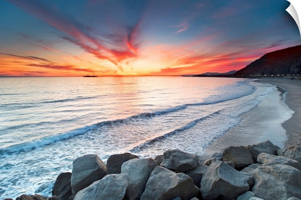 Rocks on sea at sunset.