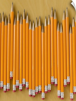 Row of pencils on table
