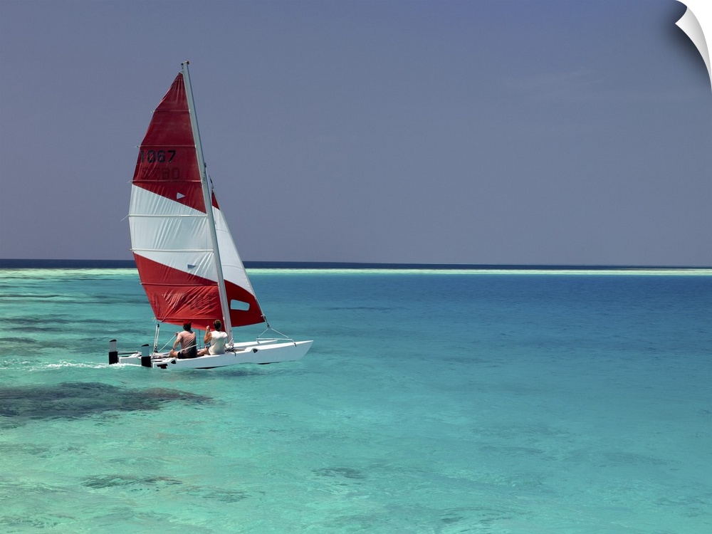 Sailboat on crystal blue water