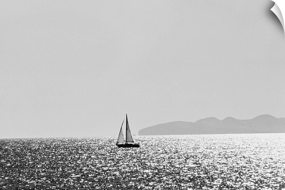 Sailboat on shimmering water