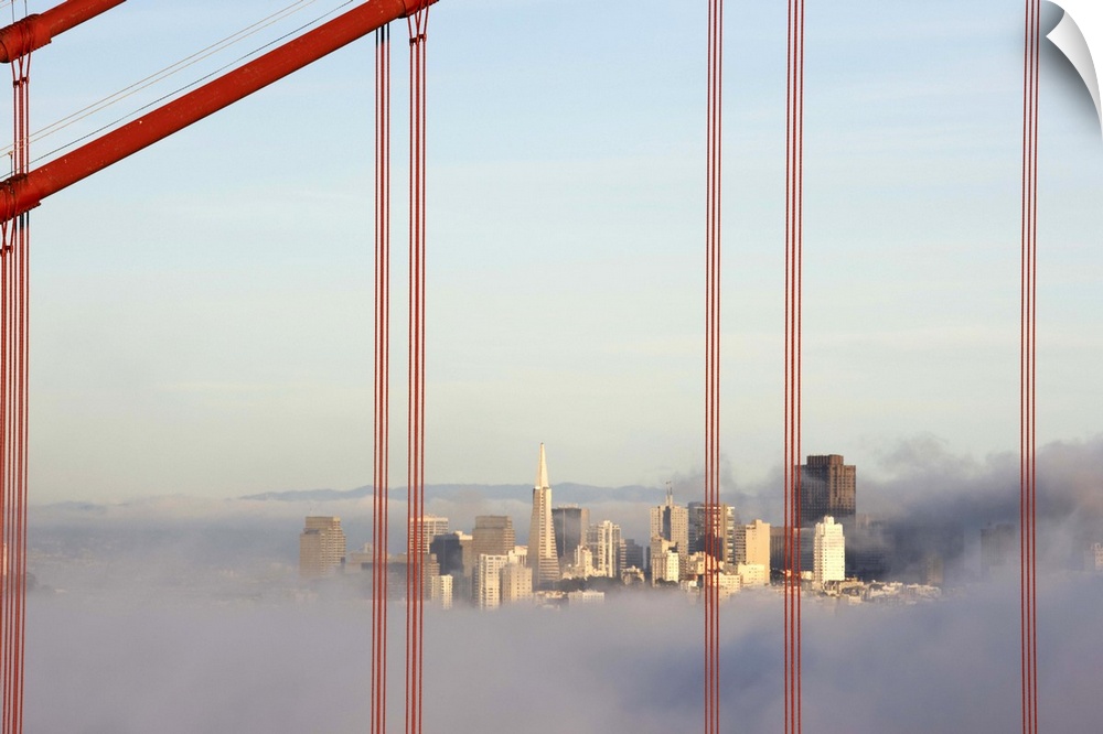 San Francisco in fog through Golden Gate Bridge.