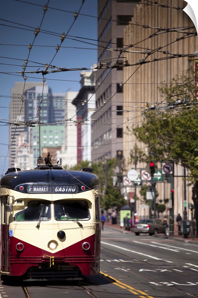 An F-line historic streetcar rumbles down Market Street heading West towards the Castro district on San Francisco's Market...