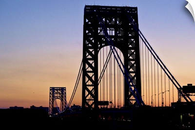 Silhouette of George Washington Bridge at sunset.