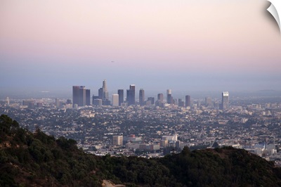 Skyscrapers of downtown LA with hills of Griffith Park