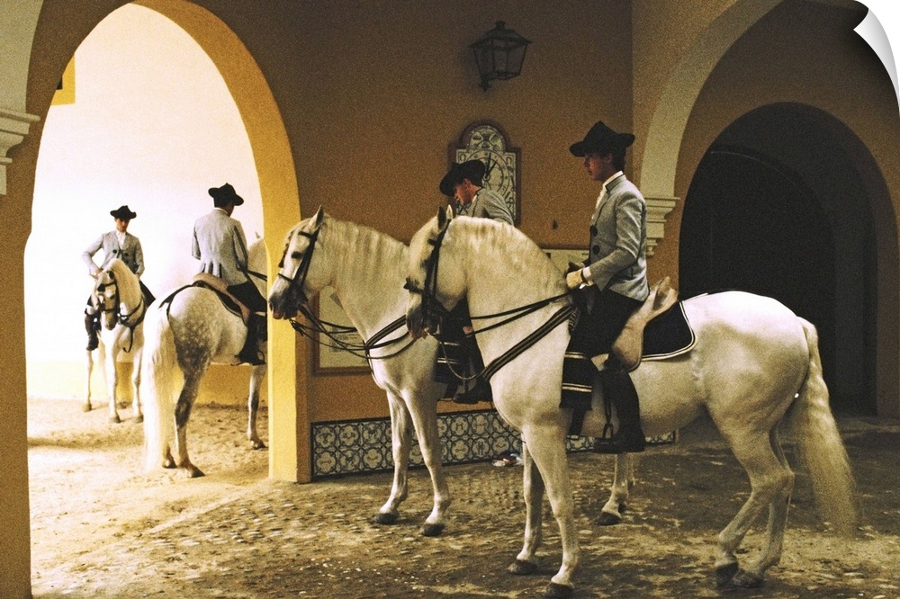 Spain,Jerez de la Frontera,School of Equestrian Art,four men on horses
